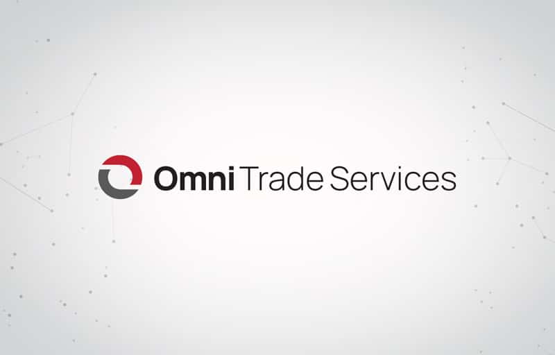 OTS Omni Trade Services Logo on grey background