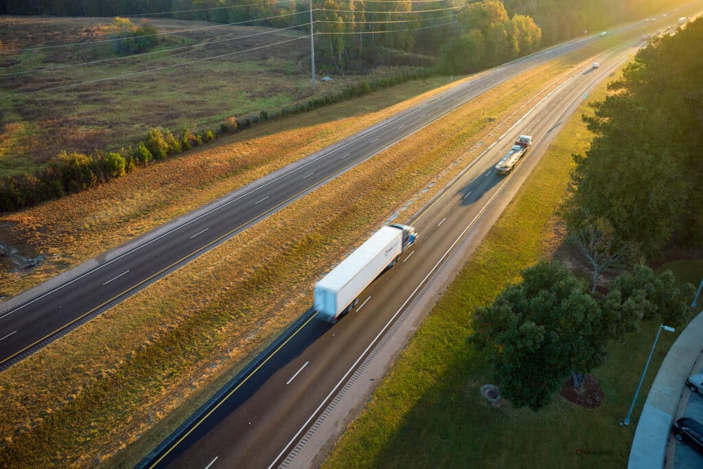ground freight semitrucks on highway