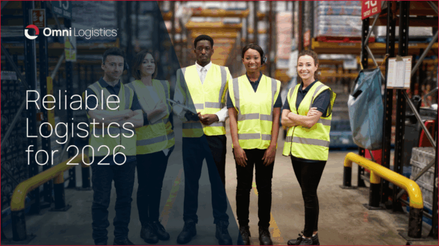 warehouse workers wearing neon vests standing in a semicircle smiling at the camera